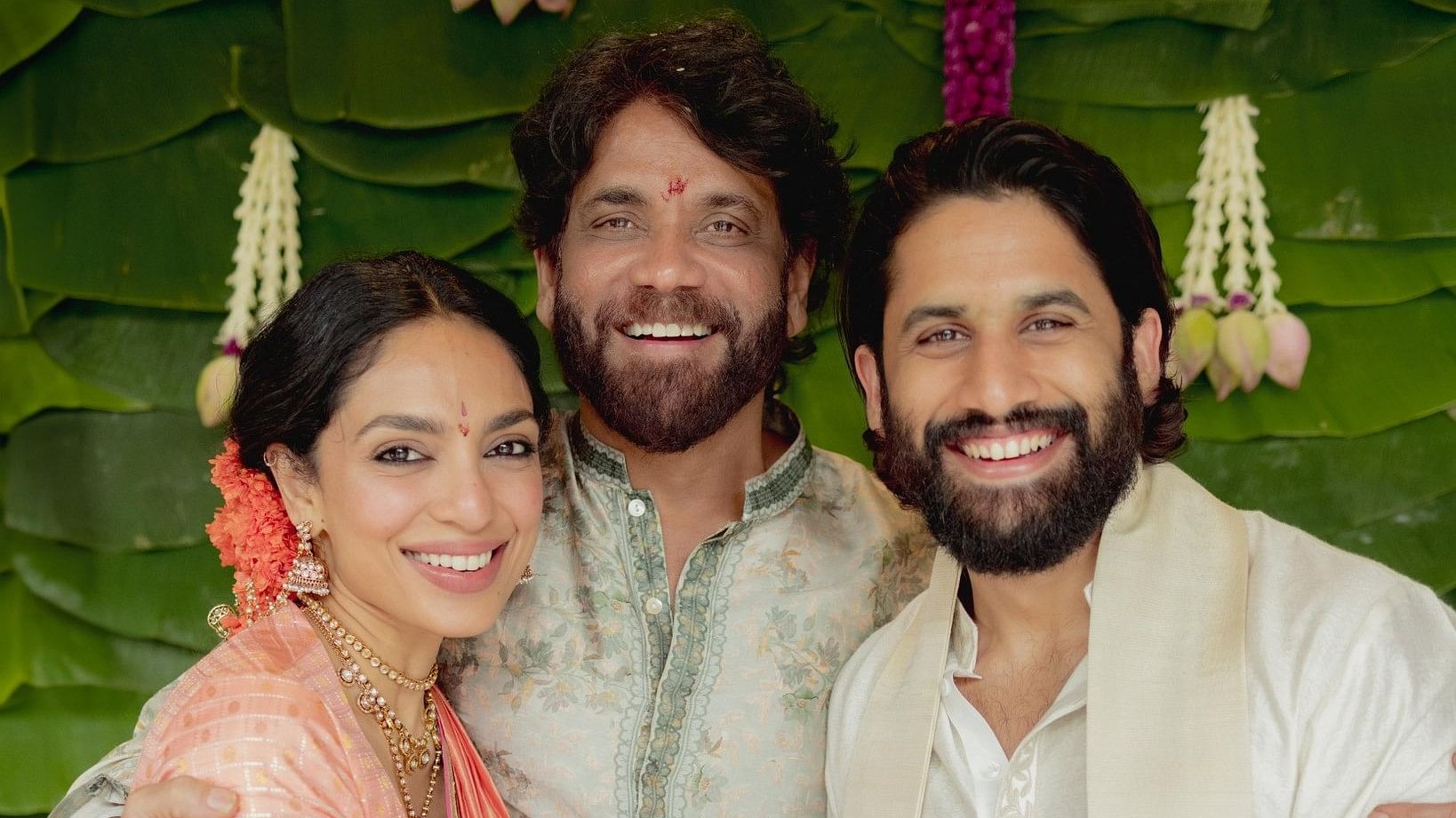 <div class="paragraphs"><p>Actors Naga Chaitanya and Sobhita Dhulipala with Nagarjuna during their engagement ceremony.</p></div>